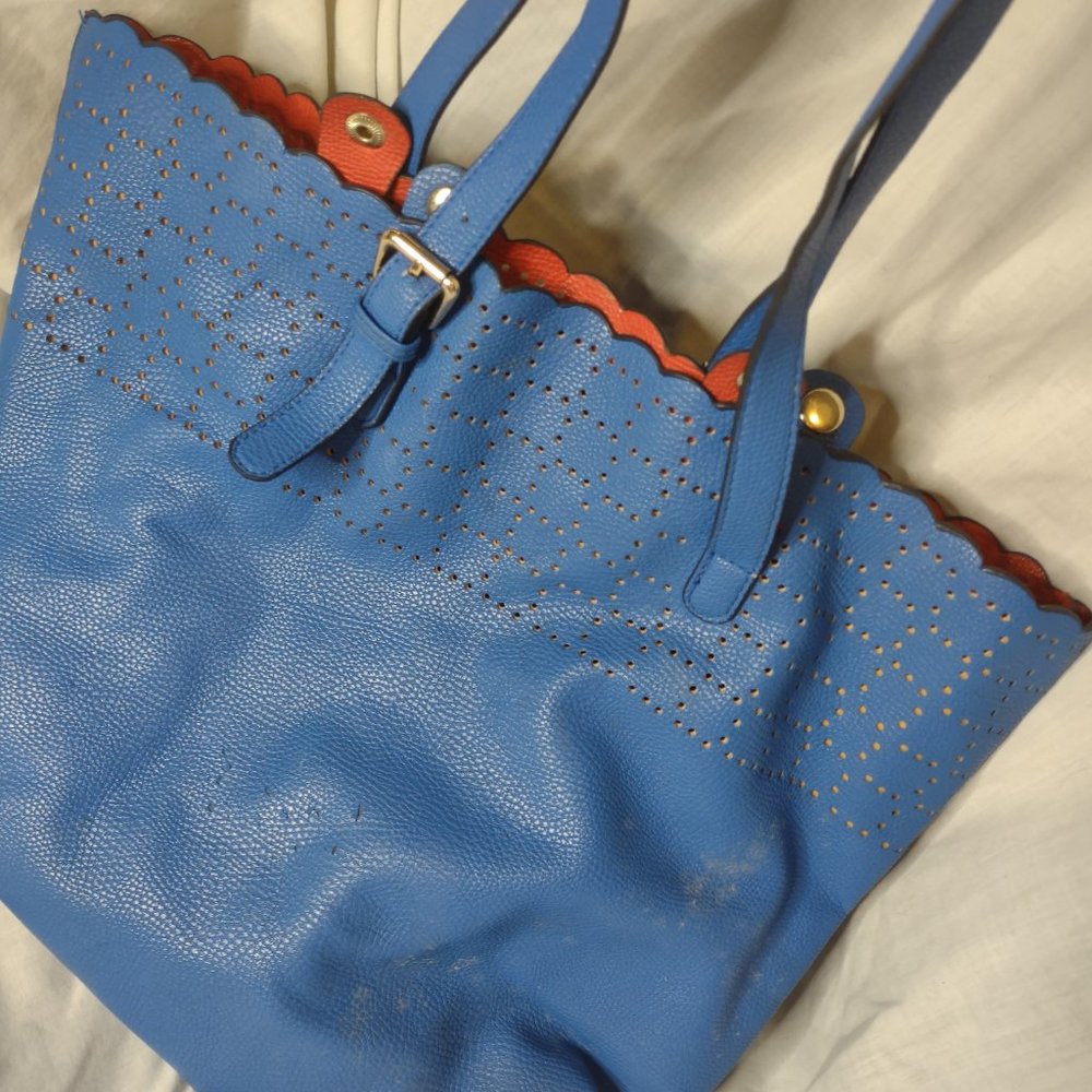 Blue Tote bag with Cutout Patter, Red Interior and Shoulder Strap
